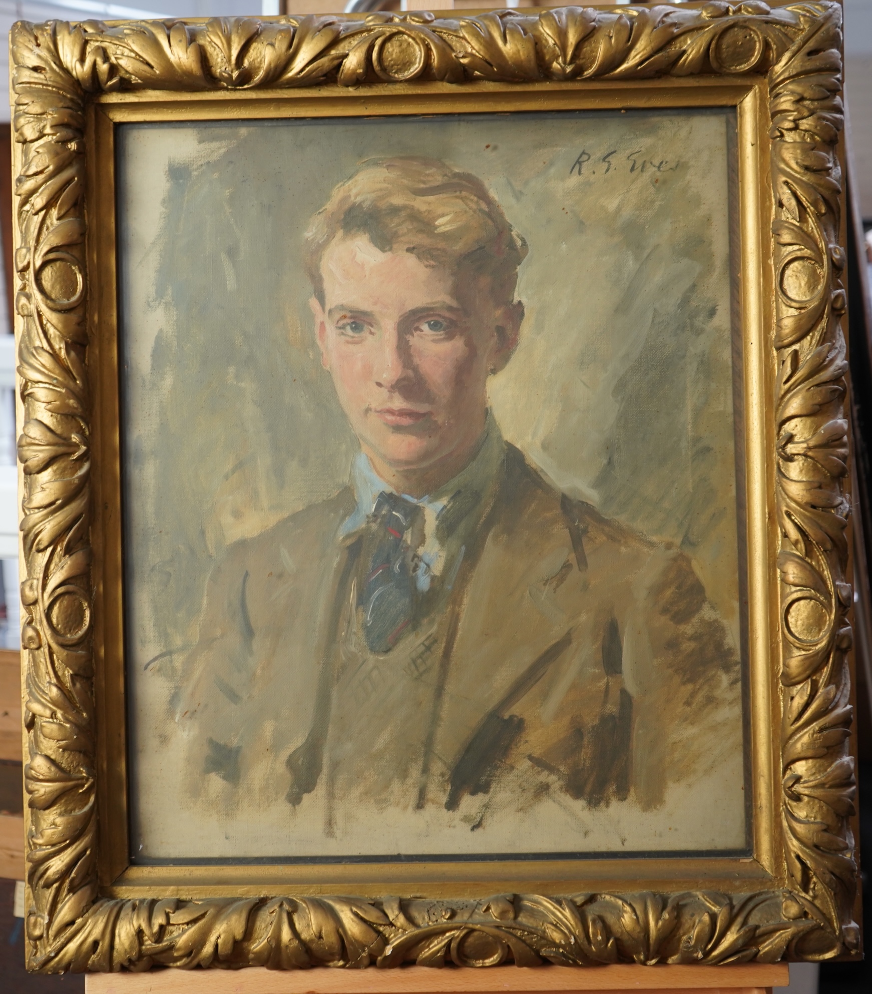 R. G Eves (1876-1941) Half length portrait of a young gentleman, signed upper right James Bourlet & Sons label verso, oil on canvas, 59 x 48cm